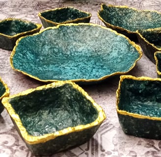 a bunch of blue green bowls with gold and glazing layer, vibrant colorsgreen and gold