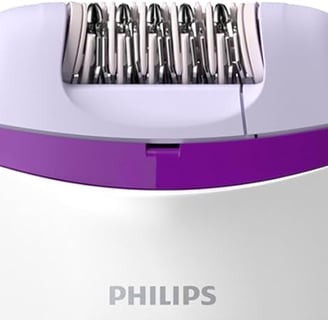 a philips electric shaver with a purple trimming