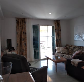 a living room with a couch and a table