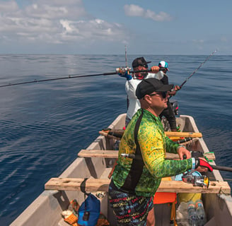 Anglers using popping technique on a Catamaran Fishing Charter in Zanzibar