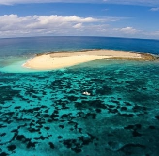 Latham Island Fishing Charters Zanzibar - Rocky coastline and crystal-clear waters of Latham Island