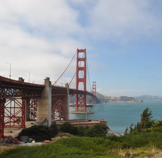 a bridge spanning the golden gate bridge over looking the water