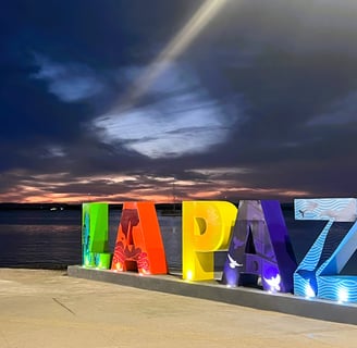 rainbow-colored letters that spell La Paz