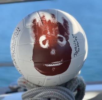 a soccer ball with a printed hand on it