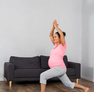 an image of a pregnant women doing yoga