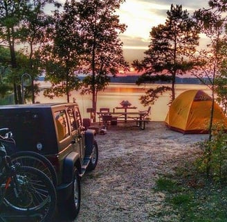 a tent pitched up in a campsite