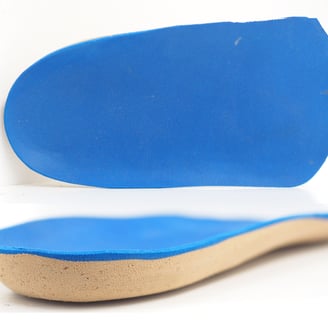 a pair of blue shoes with a blue shoe sole sole
