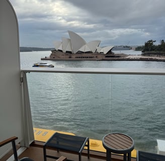 Wake up on your cruise ship balcony at Sydney Harbour next to Sydney Opera House
