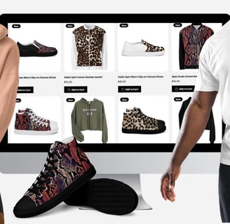 a man and woman standing in front of a computer screen displaying YESHUA Apparel products