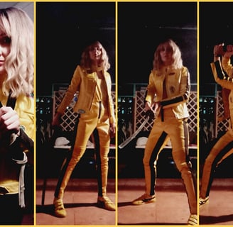 Kill Bill in yellow outfit holding a knife and a knife