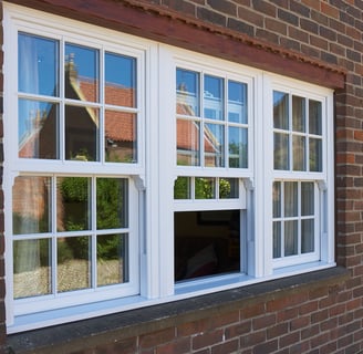 Vertically sliding sash window