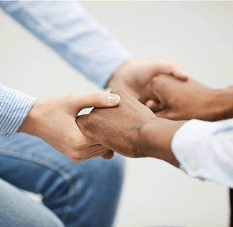 a man and woman shaking hands