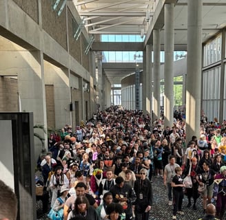 a large group of people attending a convention