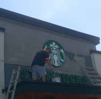 stucco repair to a Starbucks Coffee location by Premium Stucco