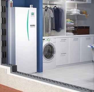 a laundry room with a washing machine and a laundry room