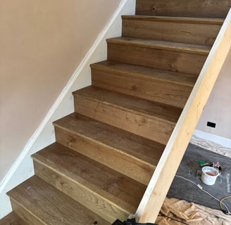 A brown oak staircase