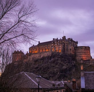 view of the edinburgh caste in the sunset