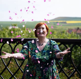 Celebrant throwing wedding confetti