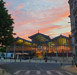 marche angouleme a building with a large glass front and a skylight