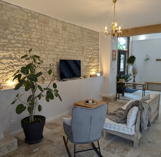 a living room with a couch and a television