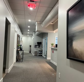 A hallway inside a clean dental office.