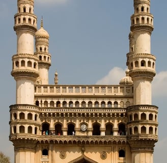 A structure with four similar columns and small window like openings