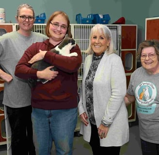 JP Stephanie Johnson holding a sweet cat while visiting HSVAWL