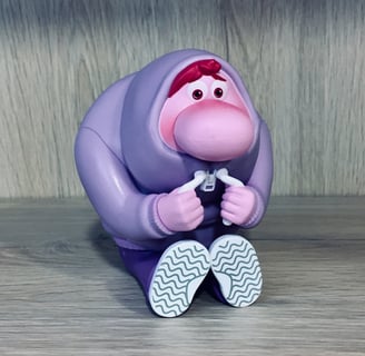 Primer plano de una figurita que representa la vergüenza