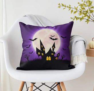 a halloween themed pillow cover with a purple and black background