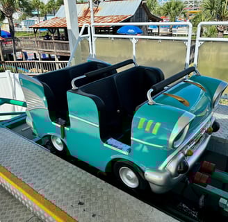 A classic car style roller coaster train