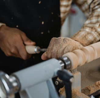 a person is using a wood lather to make a woodworking project