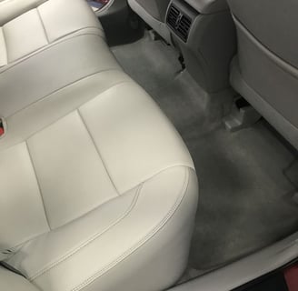 Interior Detailing Image “Deep interior car detailing with steam cleaning and vacuuming of seats"