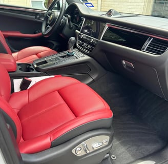 Interior Detailing Image “Deep interior car detailing with steam cleaning and vacuuming of seats"