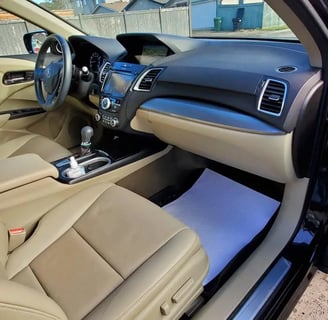 Interior Detailing Image “Deep interior car detailing with steam cleaning and vacuuming of seats"