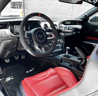 Interior Detailing Image “Deep interior car detailing with steam cleaning and vacuuming of seats"