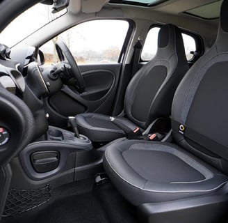 Interior Detailing Image “Deep interior car detailing with steam cleaning and vacuuming of seats"