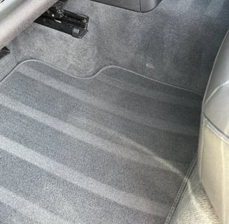 Interior Detailing Image “Deep interior car detailing with steam cleaning and vacuuming of seats"