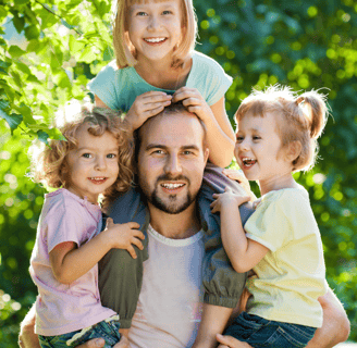 Girl dad with his three daughters