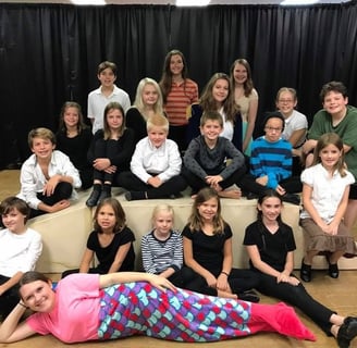 a group of children actors posing for a group photo