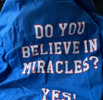 a blue shirt with a message that says do you believe in the middle of the