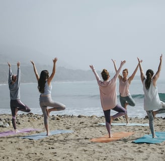 digital nomads do yoga beach portugal