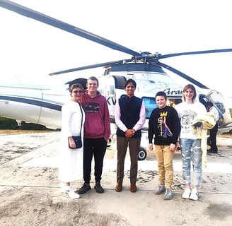 Muzammil (in the center) leading an exotic tour of Agra and Jaipur for a family travelling on their Private Jet