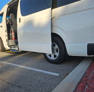 Inclusive airport transport in a 14-seater maxi van with accessibility support