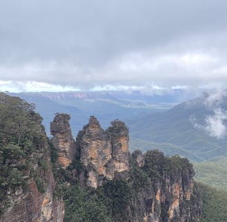 mountain formation undera cloudy sky