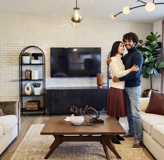 Family reviewing purchase agreement in Harvest Ridge living room