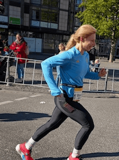 a woman running in a race