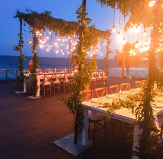 Evening wedding reception set up with hanging lights