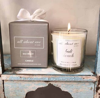 a candle that is sitting on a shelf