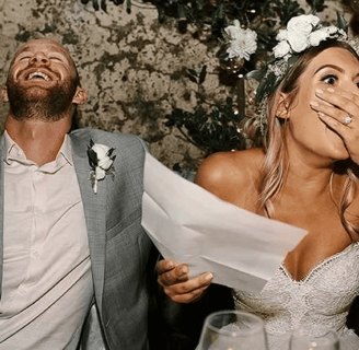 a man and woman are laughing and laughing