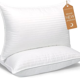 a pair of pillows and a pillow on a white background
